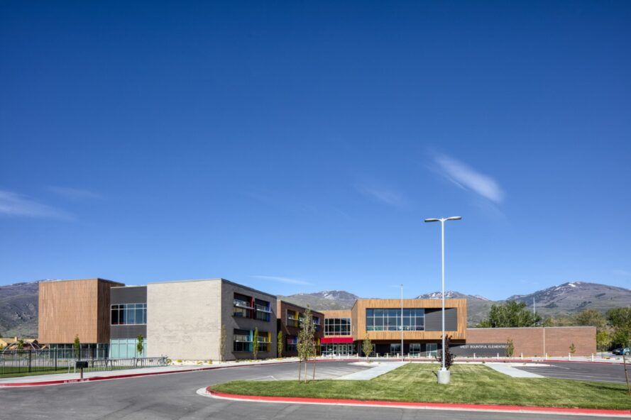 Exterior of a elementary school with a clear blue sky